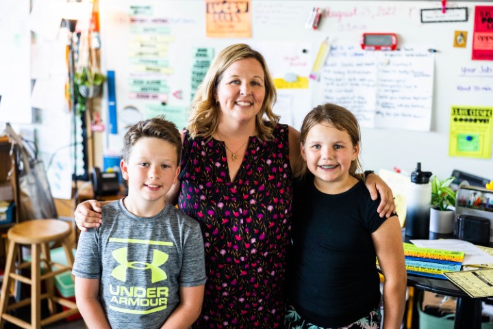 A Teacher and two students.